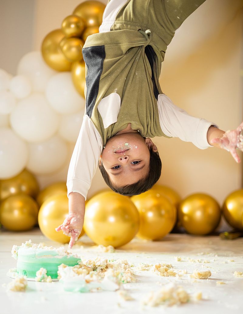 Birthday celebration photography with cake smash